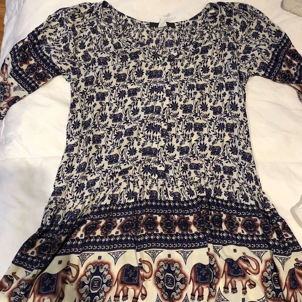 Mid sleeve dress.  No rips or stains
